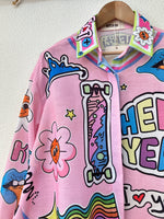 Load image in the gallery viewer,Camisa oversize GRAFFITI
