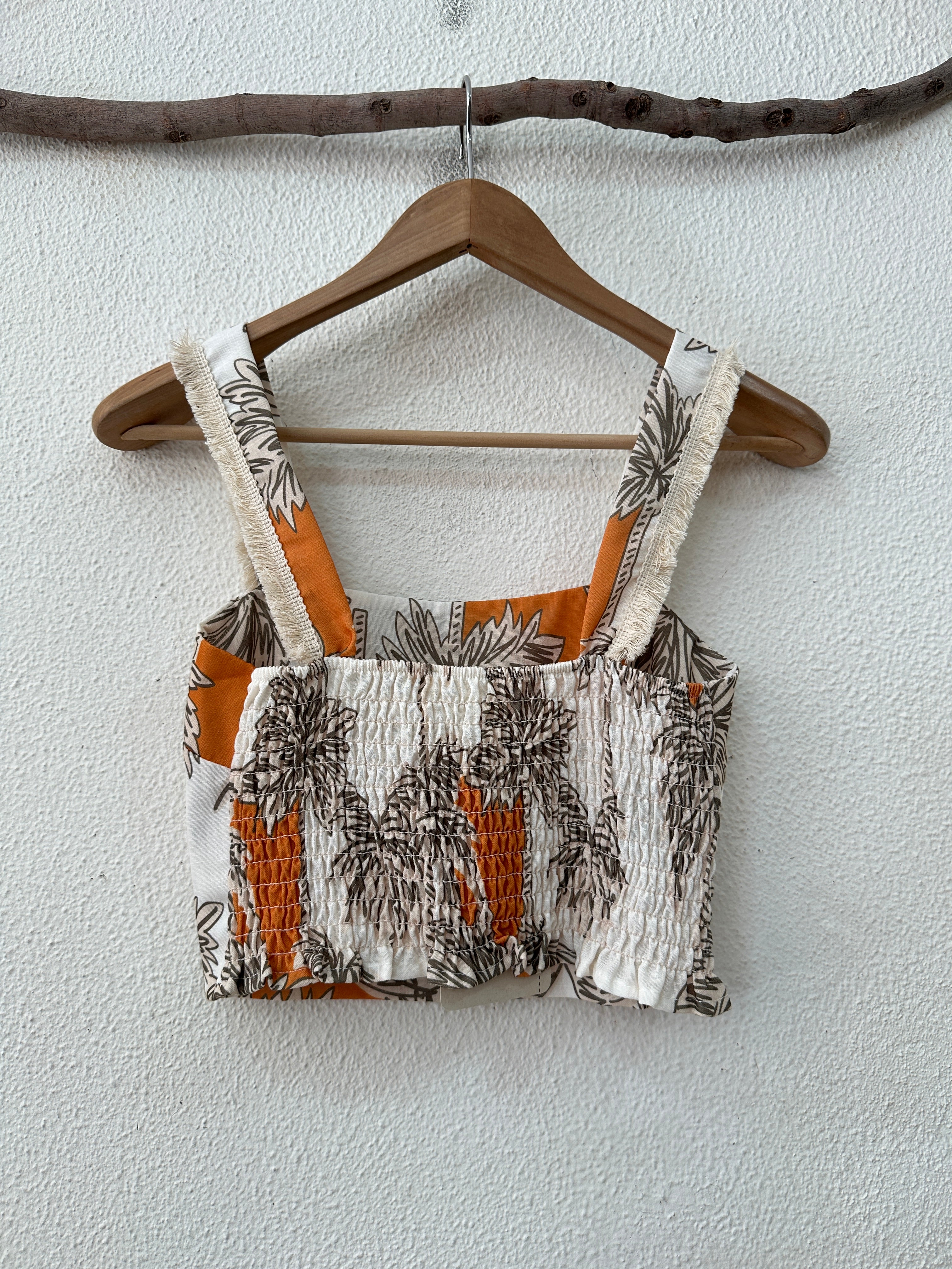 Conjunto de top e saia ISLAND