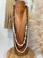 Load image in the gallery viewer,Colar comprido multivoltas YARA
