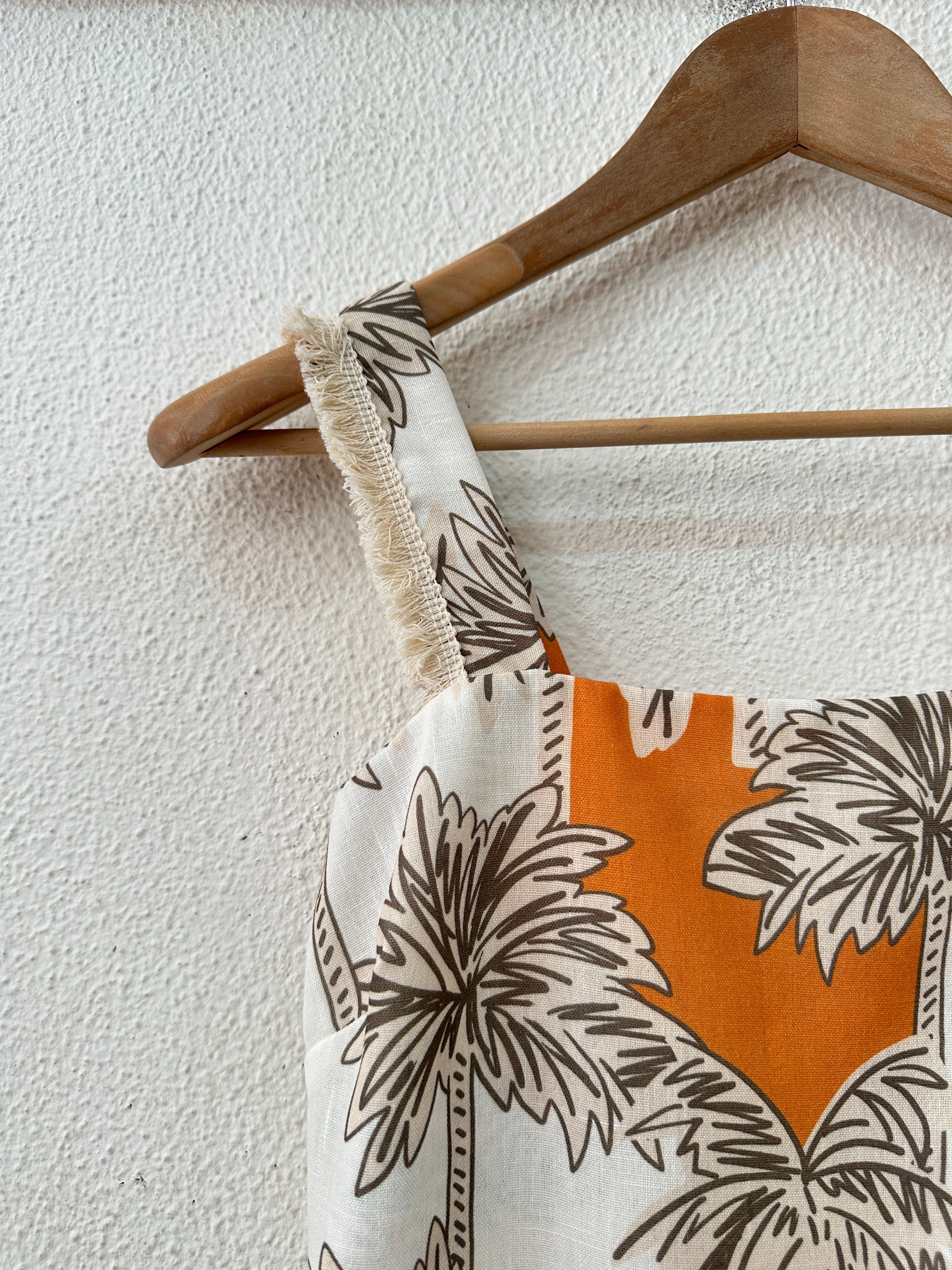 Conjunto de top e saia ISLAND