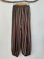 Load image in the gallery viewer,Calças em cetim estilo bombachas TANGER
