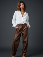 Load image in the gallery viewer,Calças em ecopele EZRA
