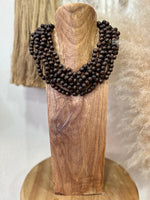 Load image in the gallery viewer,Gargantilha em madeira pintada YVANNA
