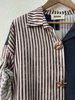 Load image in the gallery viewer,Camisa oversize c/pregadeiras amovíveis LEONA
