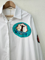 Load image in the gallery viewer,Camisa oversize c/aplicações VOYAGE
