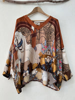 Load image in the gallery viewer,Túnica oversize c/ seda MADISON
