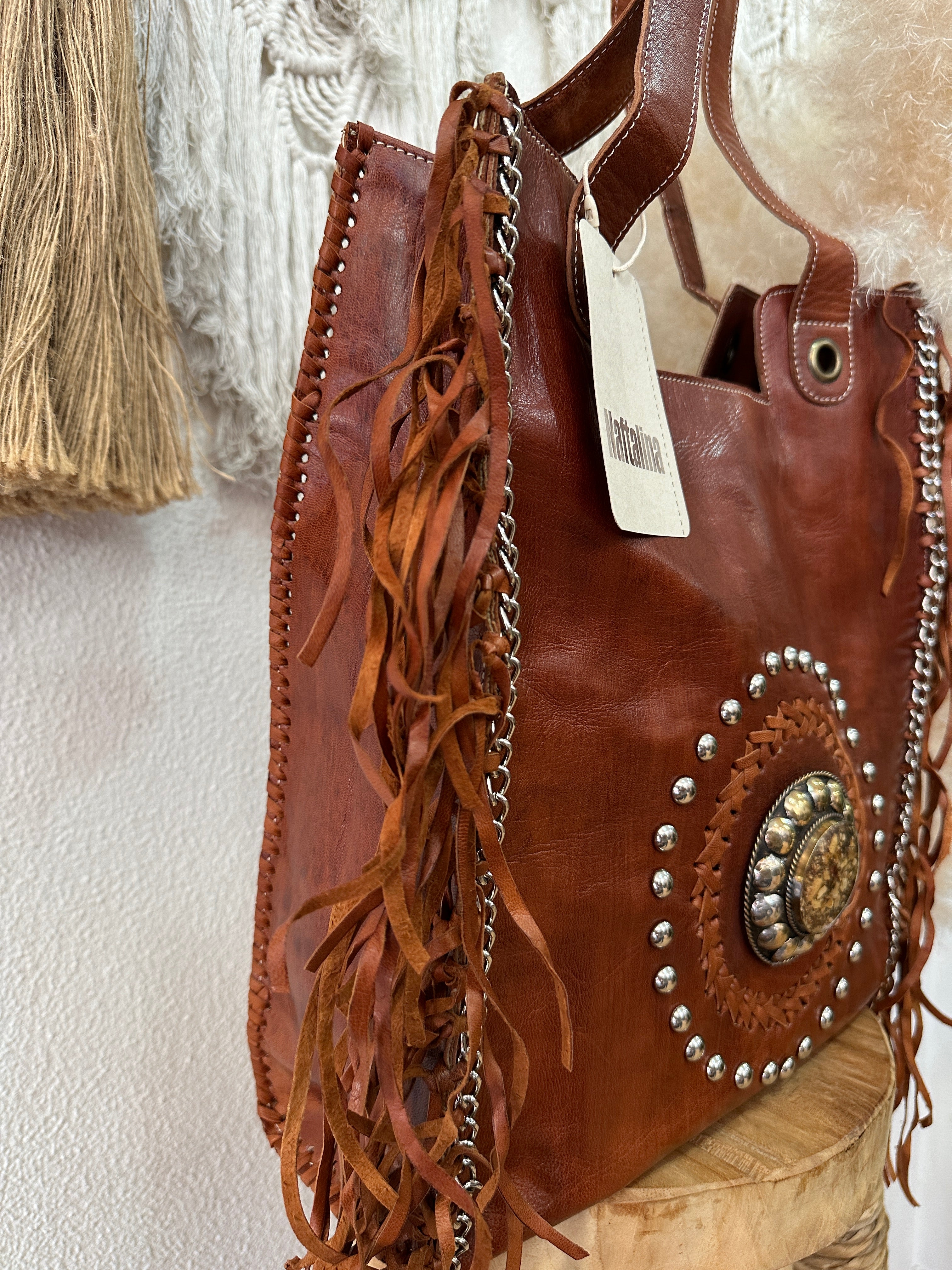 Mala em pele c/ tachas e franjas RUBY