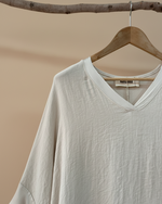 Carica l'immagine nel visualizzatore della galleria,Blusa manga morcego bege - detalhe
