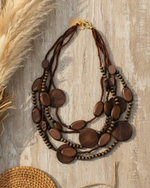 Chargez l'image dans la visionneuse de la galerie,Flat lay vertical do colar chocolate com elementos Bali
