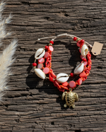 Carica l'immagine nel visualizzatore della galleria,Pulseira coral em flat lay com pampas
