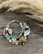 Carica l'immagine nel visualizzatore della galleria,Pulseira em flat lay com pampas
