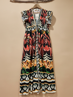 Carregar imagem no visualizador da galeria, Vestido midi print gráfico tropical com fundo de estúdio bege - frontal
