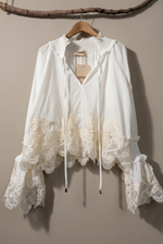 Load image in the gallery viewer,Vista lateral da blusa branca
