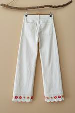 Carica l'immagine nel visualizzatore della galleria,White embroidered jeans back view studio background

